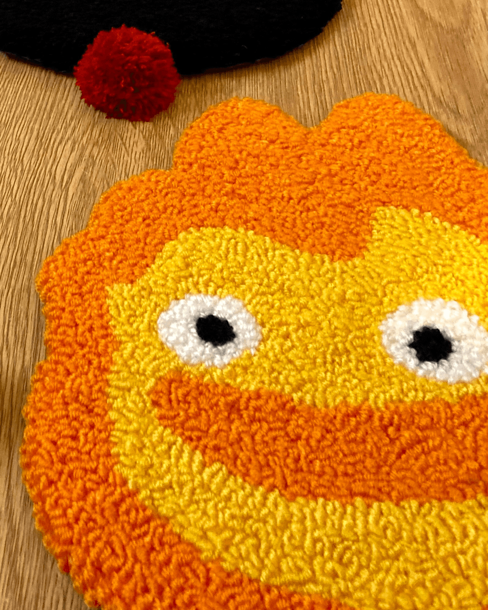 Calcifer pot mat