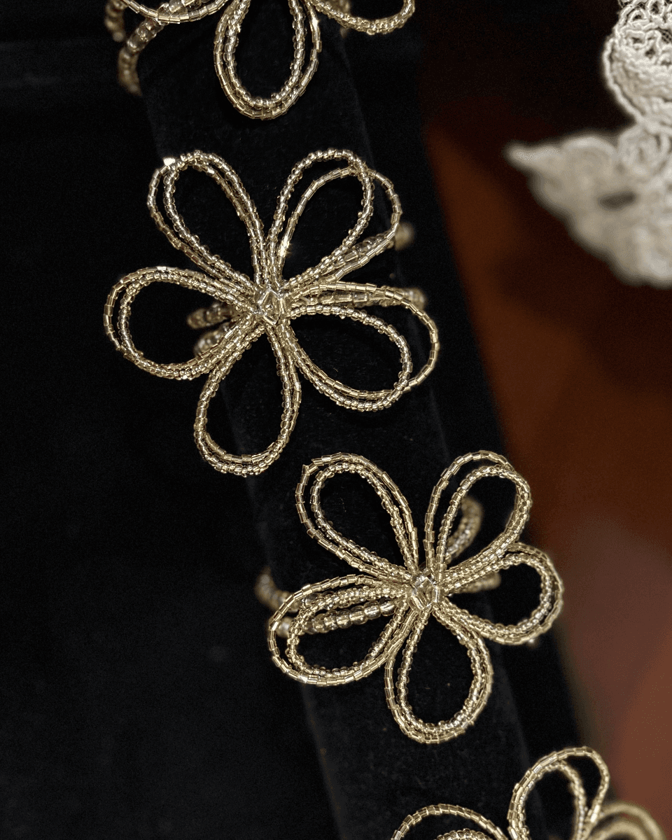 Double beaded bracelet in gold color.